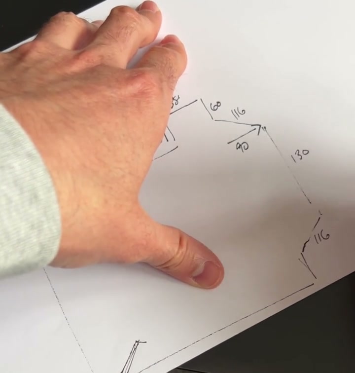 Sketching a room plan with measurements before any professional is involved