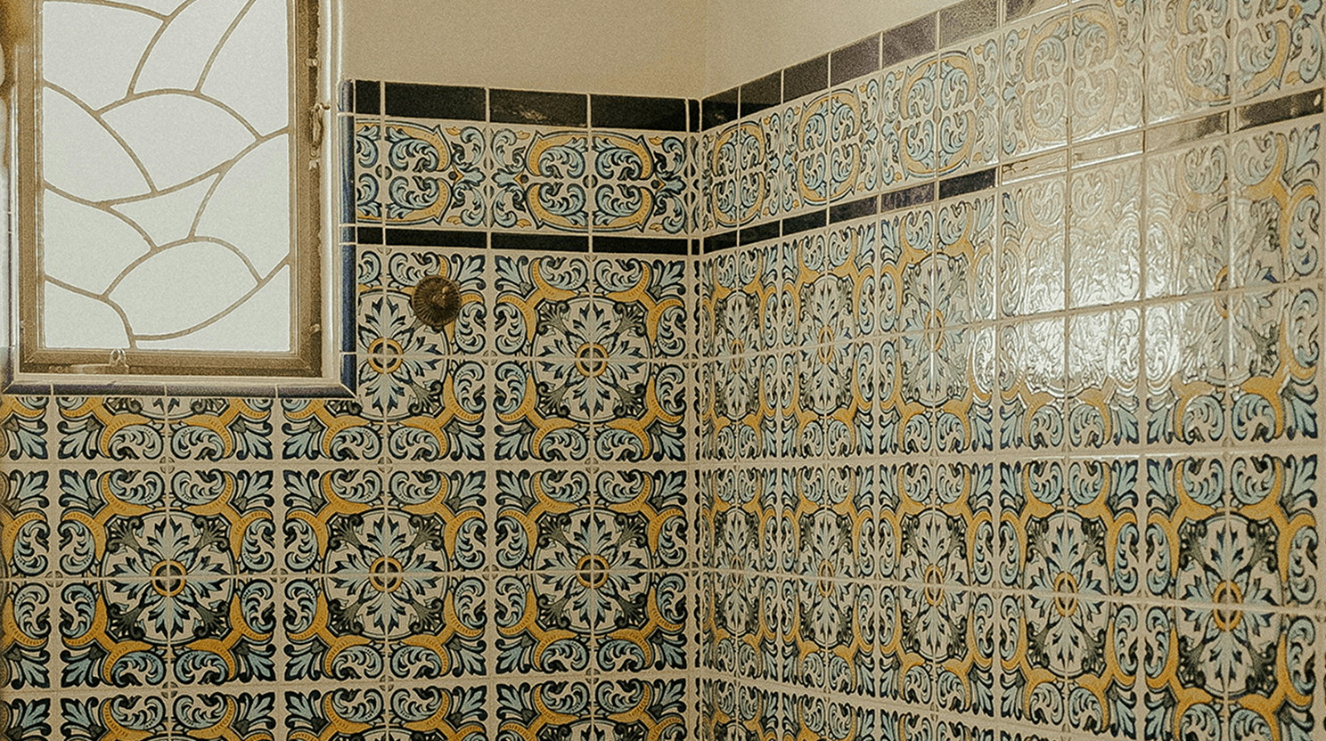Match patterned tiles on every bathroom surface