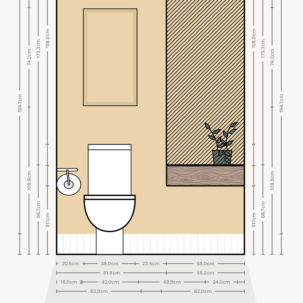 Wall elevation of a very small bathroom with a long counter and sloped ceiling
